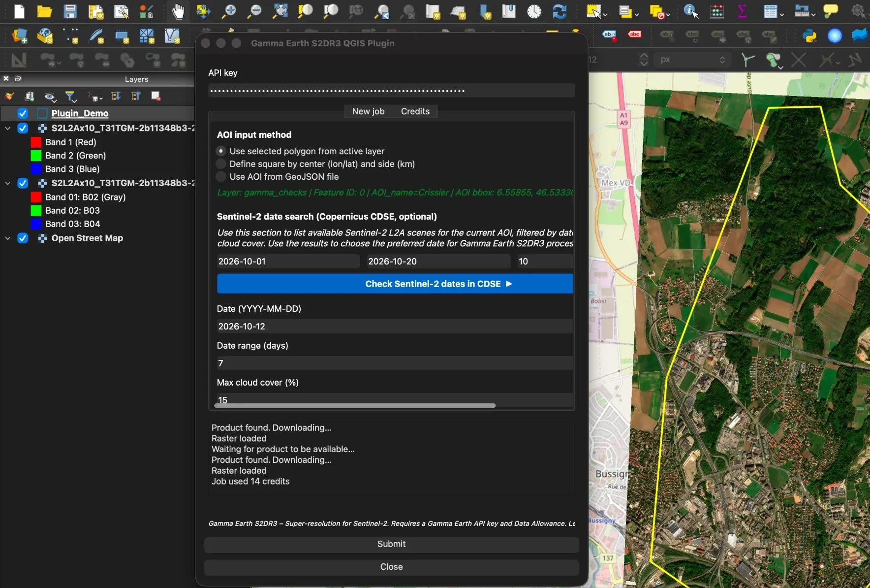 The Gamma Earth S2DR3 QGIS plugin open over a QGIS project: an API key field, New job and Credits tabs, area of interest and Sentinel-2 date search options, and a log reading Raster loaded and Job used 14 credits. Behind it, the super-resolved result is loaded on the map inside the yellow outline of the area of interest.